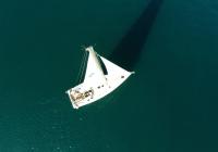 sailing yacht sailing boat Hanse 505 from above sails main sail genoa top mast